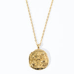 A gold-plated pendant necklace featuring a wax seal zodiac design, attached to a gold-plated chain.