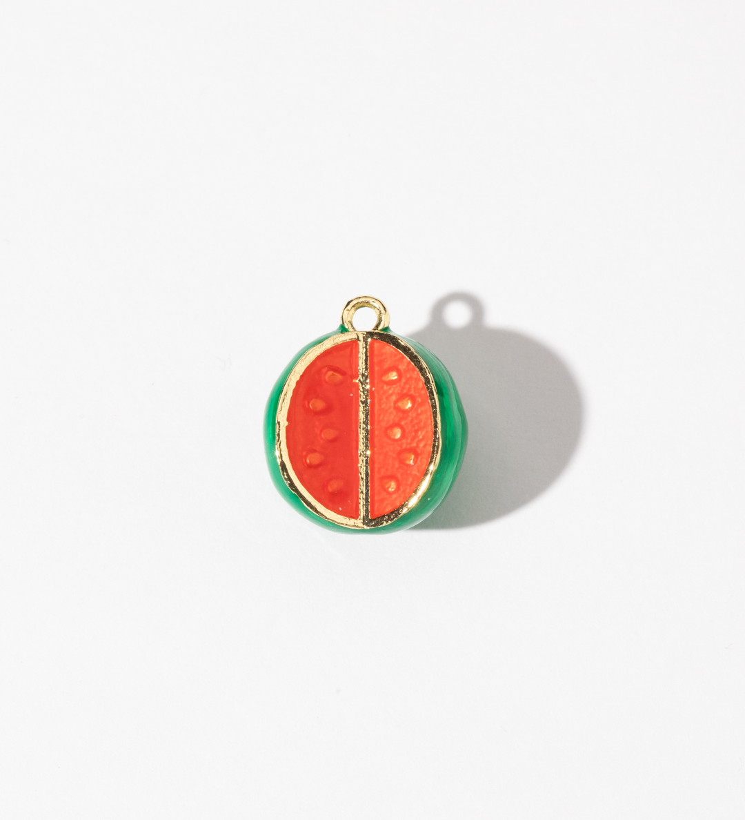 A gold-plated stainless steel charm in the shape of a watermelon slice with a glossy finish, featuring vibrant red and green enamel detailing.