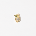 A Personalized gold-plated charm Jewelry in the shape of a lemon, adorned with clear zirconia stones and green gem leaves.