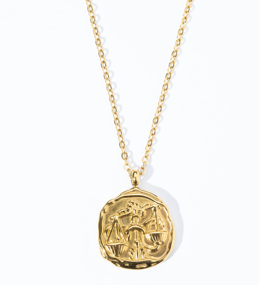 A gold-plated pendant necklace featuring a wax seal zodiac design, attached to a gold-plated chain.
