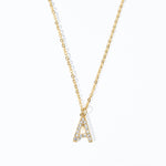 A gold-colored necklace with personalized initial displaying the necklace with a single letter 'A' pendant adorned with clear stones on a white background.