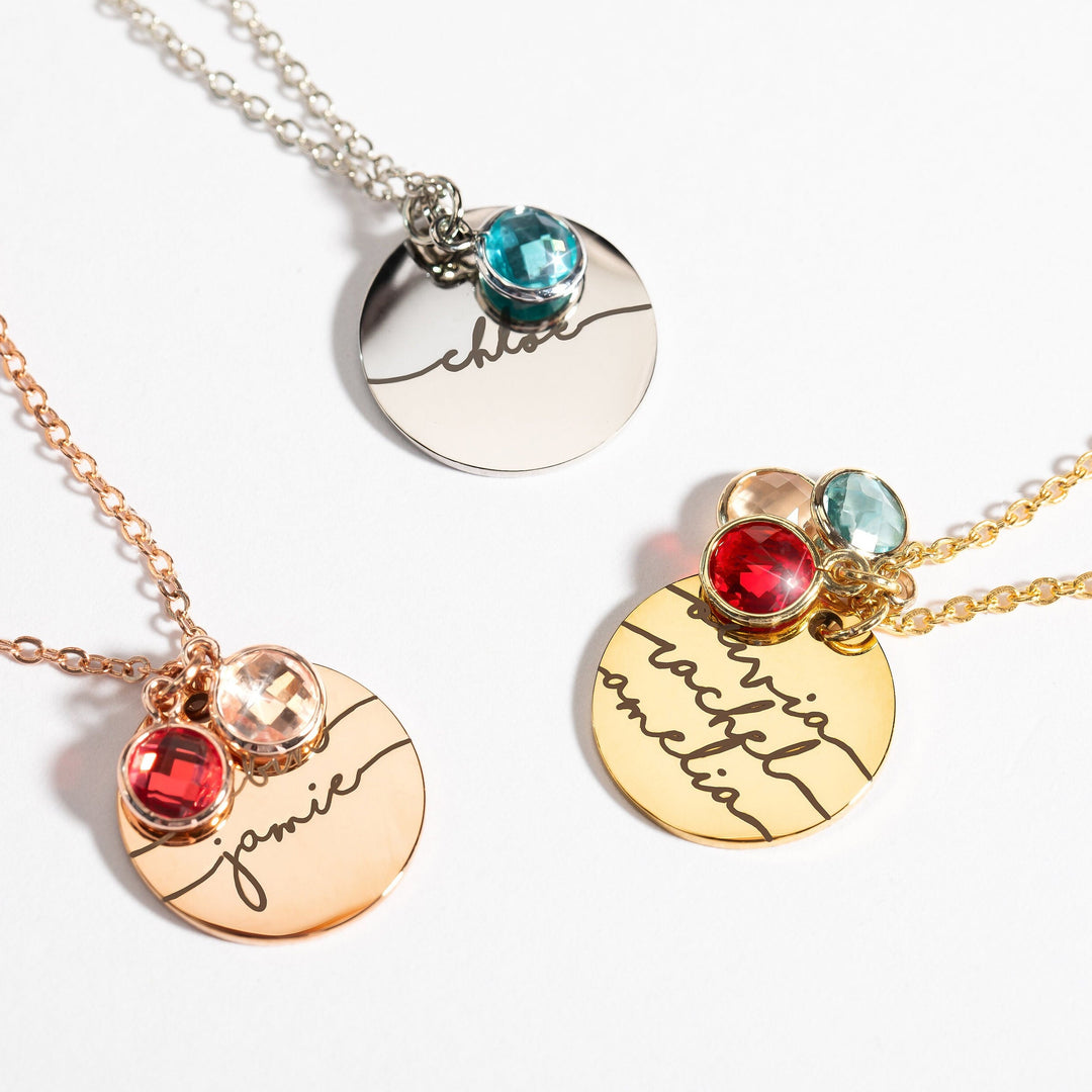 A series of three necklaces showing different styles with birthstone charms and personalized engraved names. Each necklace has a metallic finish and a chain.